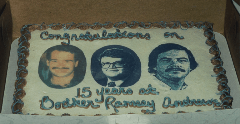 Cake from the 15th anniversary party featuring photos of Brian Bodker, Tim Ramsey, and Steve Andrews (l-r)